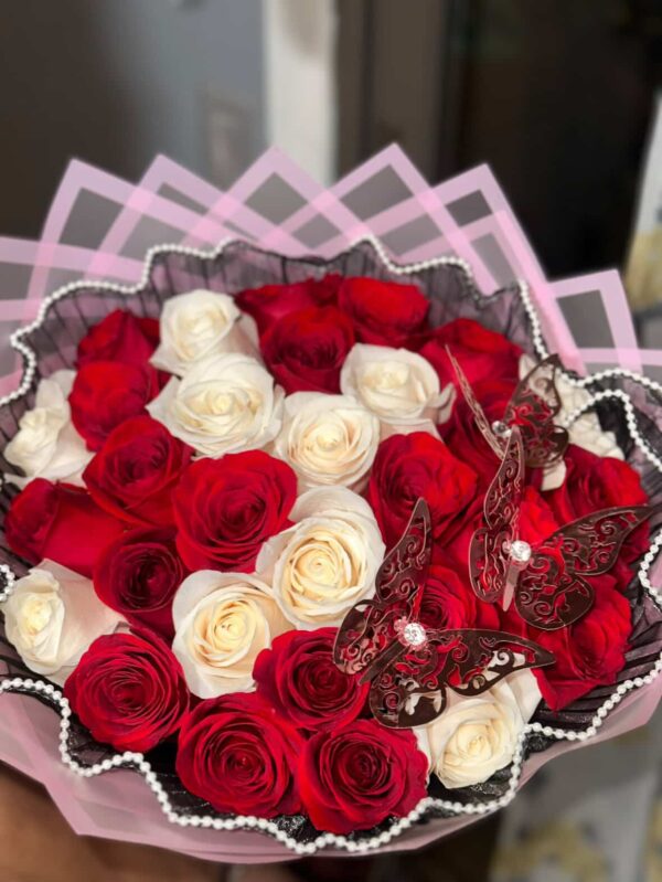 Bouquet of white and red roses