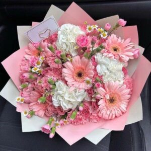 Bouquets of gerberas and roses
