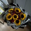 Bouquet of roses and sunflowers