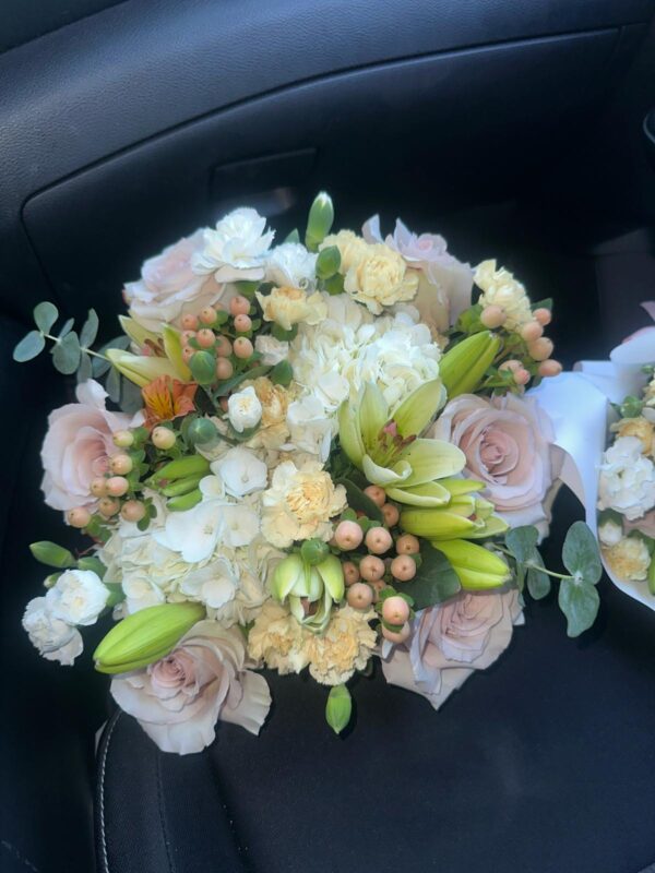 Bouquet of pink roses with flowers